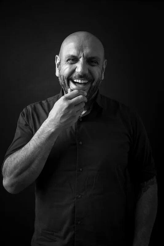 Portrait of Charbel A. Zeaiter, laughing